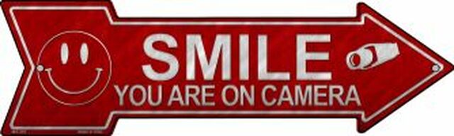 Smile Youre On Camera Metal Arrow