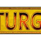 Sturgis Metal Arrow Sign