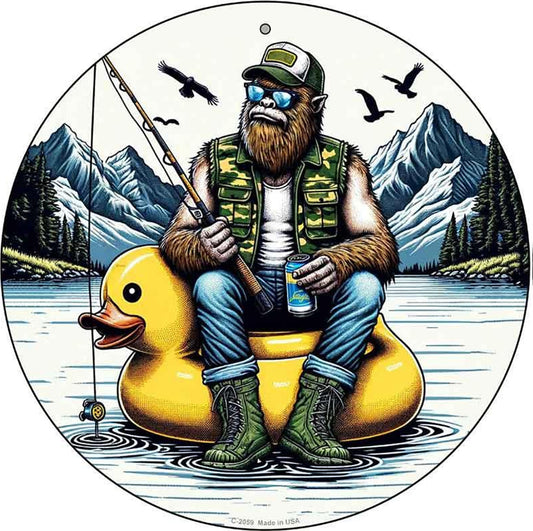 Bigfoot Fishing on Inflatable Duck Novelty Metal Circular Sign