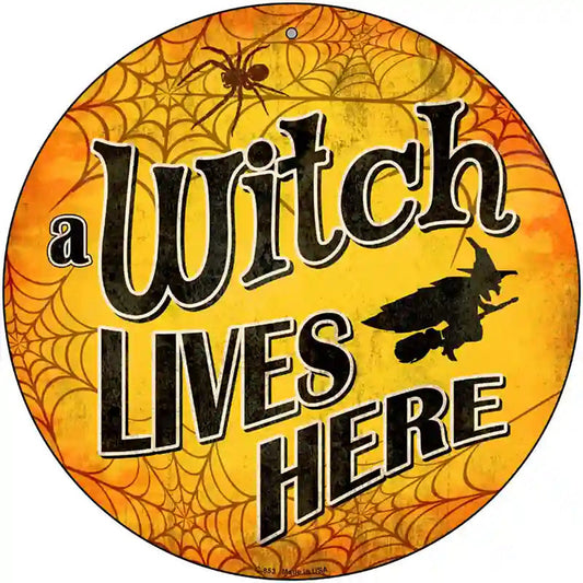 A Witch Lives Here Novelty Metal Circular Sign